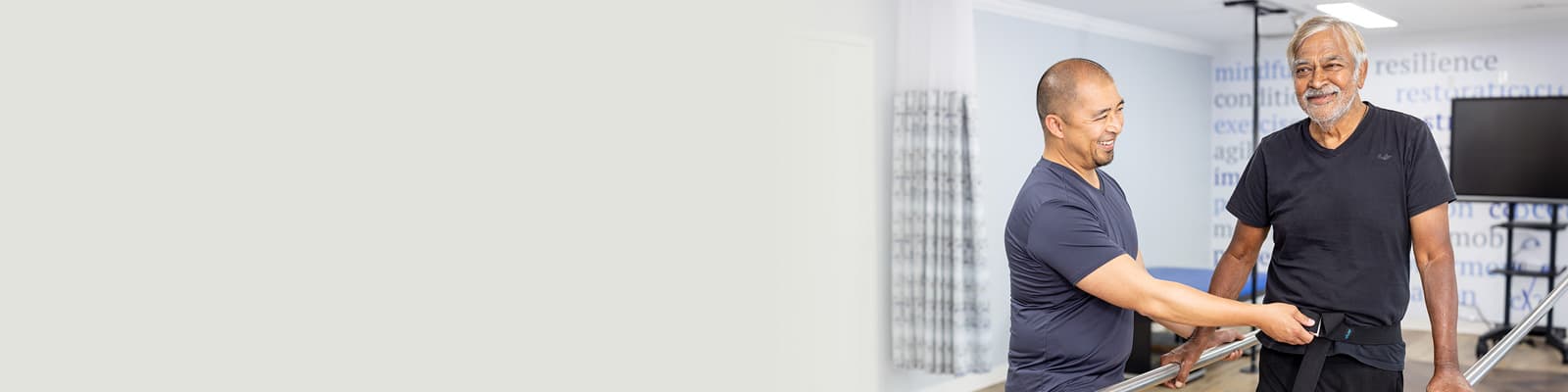 A physical therapist helping a man walk at Sunnyvale Post Acute